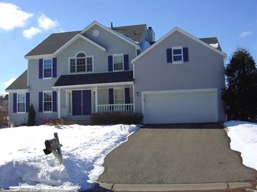 Garage Addition with Living Space Above