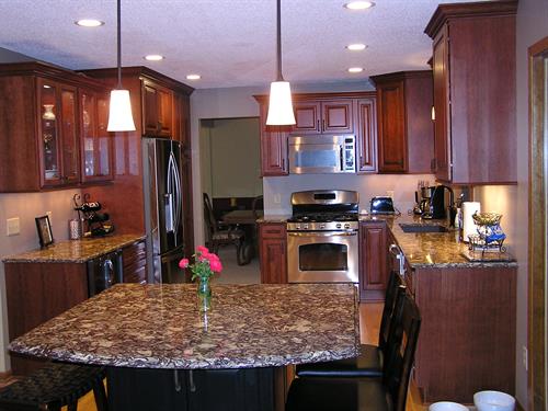 Kitchen with Cherry Cabinets and Cambria Countertops