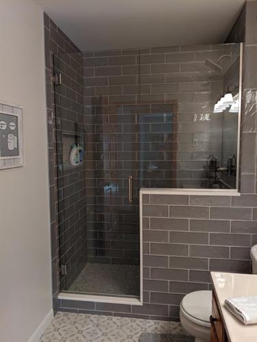 Custom Frameless shower door and panel