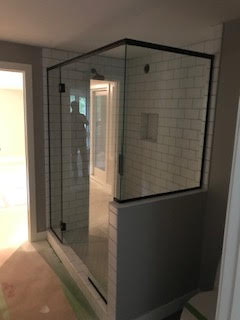 Customer shower door and panel with 90 degree return panel