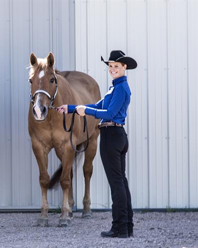 Styling for the Show Arena in a RHE Button Down shirt. Available in several colors. Styling for the Show Arena in a RHE Button Down shirt. Available in several colors.