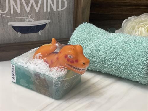 Orange dinosaur soap
