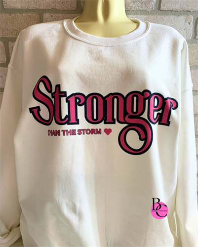"Stronger than the storm" A sweatshirt that says "Stronger than the Storm" is typically a piece of clothing with a motivational or inspirational message