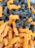 Halloween pasta made with squid ink and tomato/carrot puree