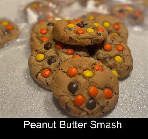 PB Smash (peanut butter cookie with milk chocolate chips, recesses pieces and stuffed with a entire peanut butter cup.  