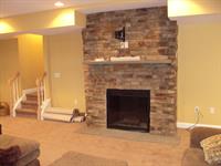 stone fireplace in finished basement in Mullica Hill, NJ