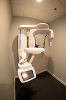 This is our panoramic x-ray machine. It is digital and allows us to see the structure of your jaw, bone & roots of the teeth instantly on our computer software.