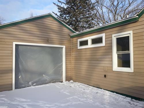 Restoration with New Wall Reconstruction, Insulation, Siding, Windows, and Trim