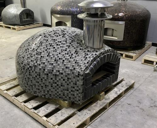 Nardona Rustico Oven with black brick face and tile.