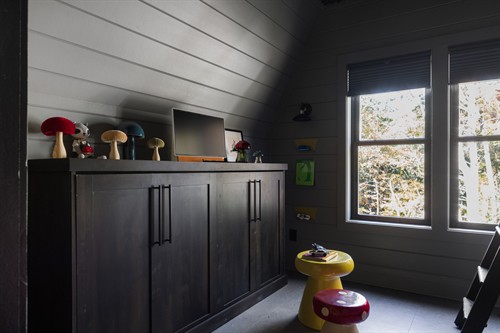 Cellular shades in the playroom.