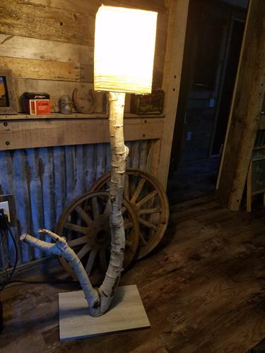 Log lamp available $100