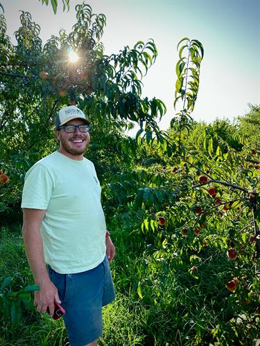 Harrison of Kickapoo Orchards leads a tour