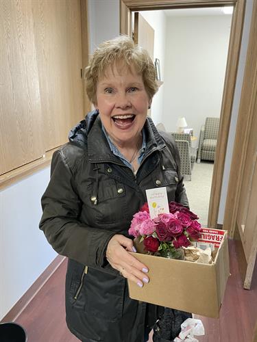 ICP volunteers deliver Birthday arrangements, made with rescued flowers by Petal Pushers volunteers, to clients