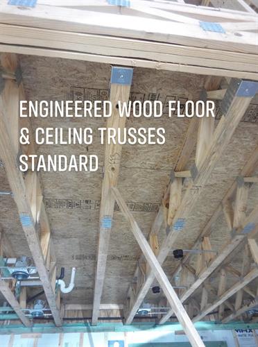 Standard Spec: Engineered wood florr and roof trusses standard bonus room and 2 story homes