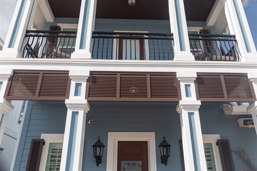 Fiberglass exterior spandrel shutters