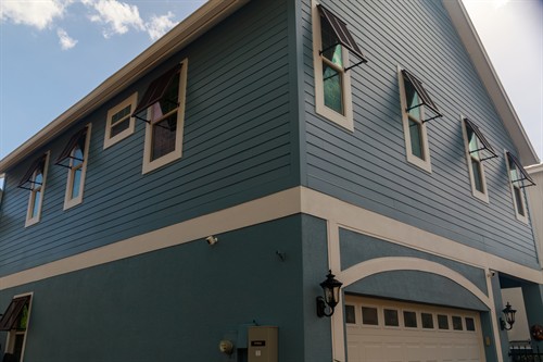 Fiberglass eyebrow exterior shutters