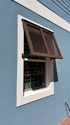 Fiberglass eyebrow exterior shutter