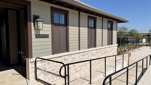 Composite exterior shutters trapped openings
