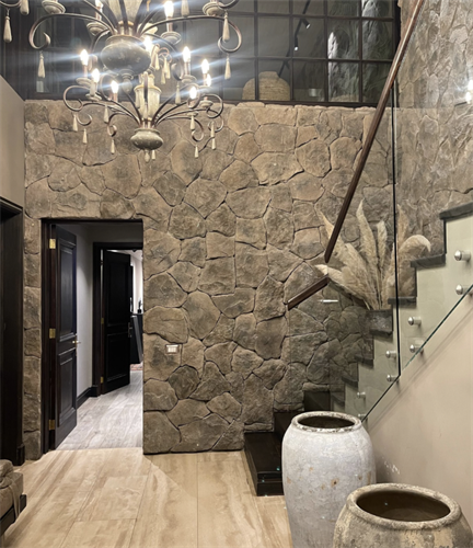 Custom stone installation with integrated lighting as part of a full home remodel. Designed and executed by ROCA.