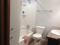 Bathroom remodel:  Tub, stool, vanity/sink, built-in, flooring, and refinishing.