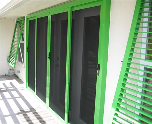 Articulating Blade Bahama Shutters and Stainless Steel Security Screen
