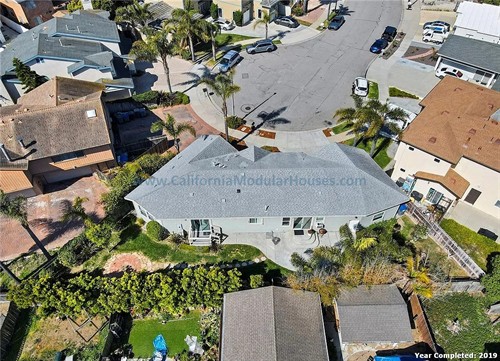 Aerial view of a suburban neighborhood showing this completely custom designed modular home.  California Modular Houses. Pre fab home.  Modular homes for California.  Casas prefabricadas.  Southern California. 