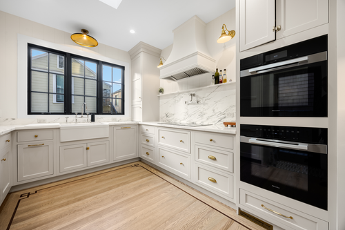 As part of our Golden Gate Heights renovation in San Francisco, we redesigned the kitchen with modern finishes while maintaining the home's historic character.