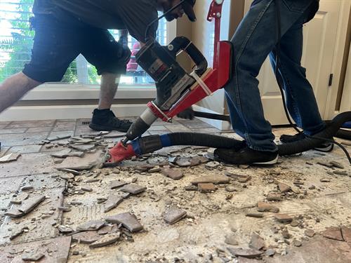 Removing tile and controlling dust. It's what we do!