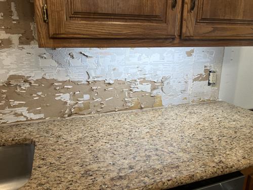 We also remove backsplash and wall tile like showers. 