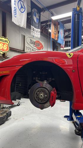 Ferrari F430 being lowered to track spec