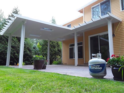 Insulated Roof Panel Patio Cover System with skylights and recessed lighting  