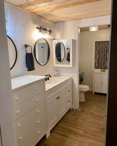 Bathroom remodel: flooring, tongue and groove ceiling, shower surround, vanity lighting & fixtures