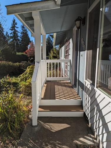 New front porch supports, rebuild of deck and stairs, paint to match. 