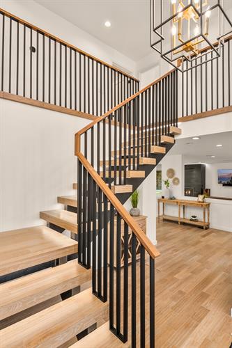 Floating Stair Stringer with Custom Steel Railing