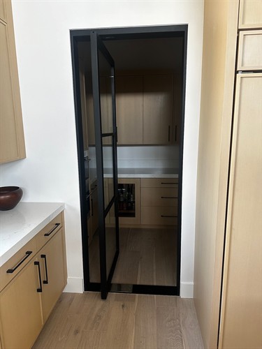 Pantry pivot door