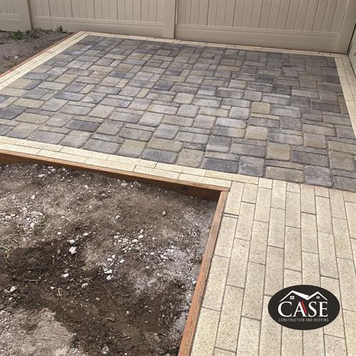 Gallery Image case-construction-and-roofing-pavers-border-patio-and-walkway.jpg