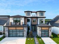 Waterfront Contemporary Home with Courtyard & Rooftop Deck