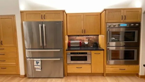 Kitchen remodeling project completed by Alderwood Builders LLC showcasing custom cabinetry, built-in stainless steel appliances, and premium craftsmanship in Bellingham, WA.
