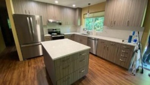 Residential kitchen remodeling project showcasing custom cabinetry, island workspace, and modern finishes in Bellingham, WA