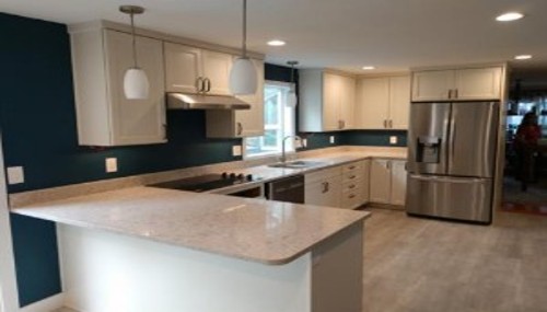 Contemporary kitchen renovation featuring custom cabinets, upgraded appliances, and improved functionality done by custom kitchen in Skagit County.