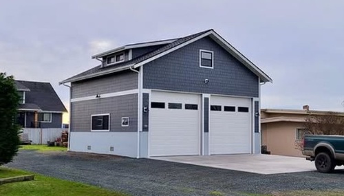 Custom detached garage construction providing additional storage, workspace, and property value for homeowners throughout Island County.