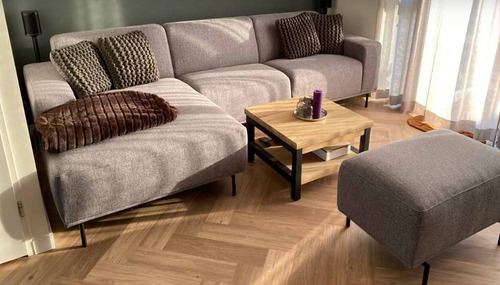 Contemporary living room featuring luxury flooring installation completed by NW Granite & Flooring.