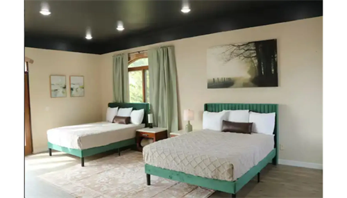 Bright and modern guest suite remodel featuring updated flooring, stylish furnishings, and clean interior finishes. Bright and modern guest suite remodel featuring updated flooring, stylish furnishings, and clean interior finishes.