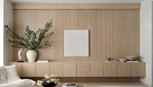 Custom wood feature wall and modern interior design by D Studio 11, serving Camano Island, Skagit Valley, and Snohomish County with clean, natural finishes and elevated living spaces.