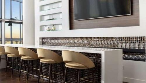 Custom bar and luxury interior design for a skyline penthouse in Las Vegas by D Studio 11, blending modern finishes, elevated materials, and high-end functionality.