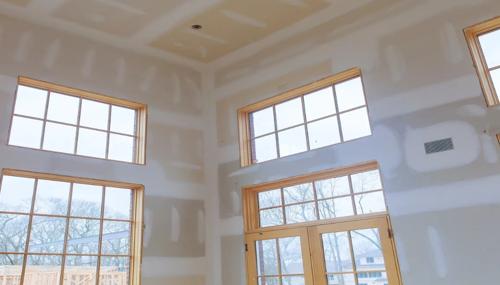 Skagit County drywall services showing newly installed sheetrock, taped seams, and finished wall joints in a remodel.