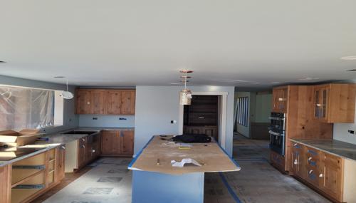 Residential drywall repair in Snohomish and Skagit County with new cabinetry, ceiling finishing, and interior wall updates.