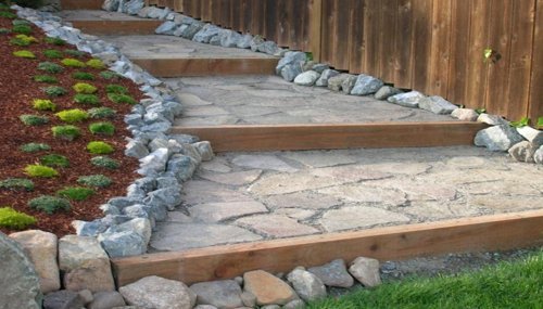 Stone step walkway and hardscape installation in Anacortes, WA designed for safe access and natural landscape integration.