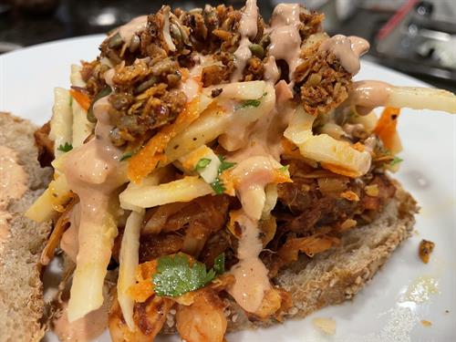 BBQ Jackfruit Sandwich with Jicama Slaw & Spicy Bloody Mary Grounded Granola 