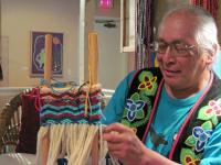 Traditional Ojibwe finger-weaving, demonstrated by Dennis White 